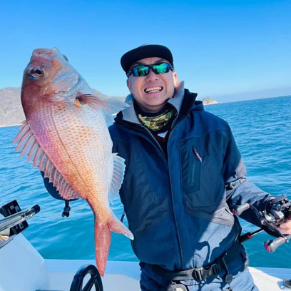 釣り上げた鯛 お客様 笑顔